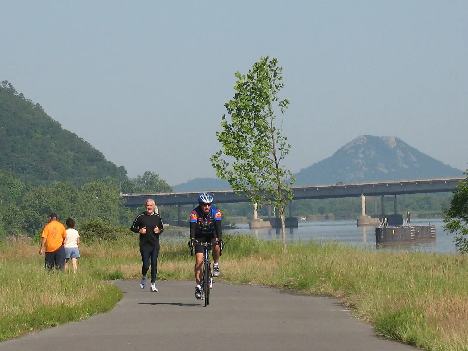 Arkansas River Trail — users enjoying the western portion of the trail with Pinnacle Mountain in the background, in central Arkansas