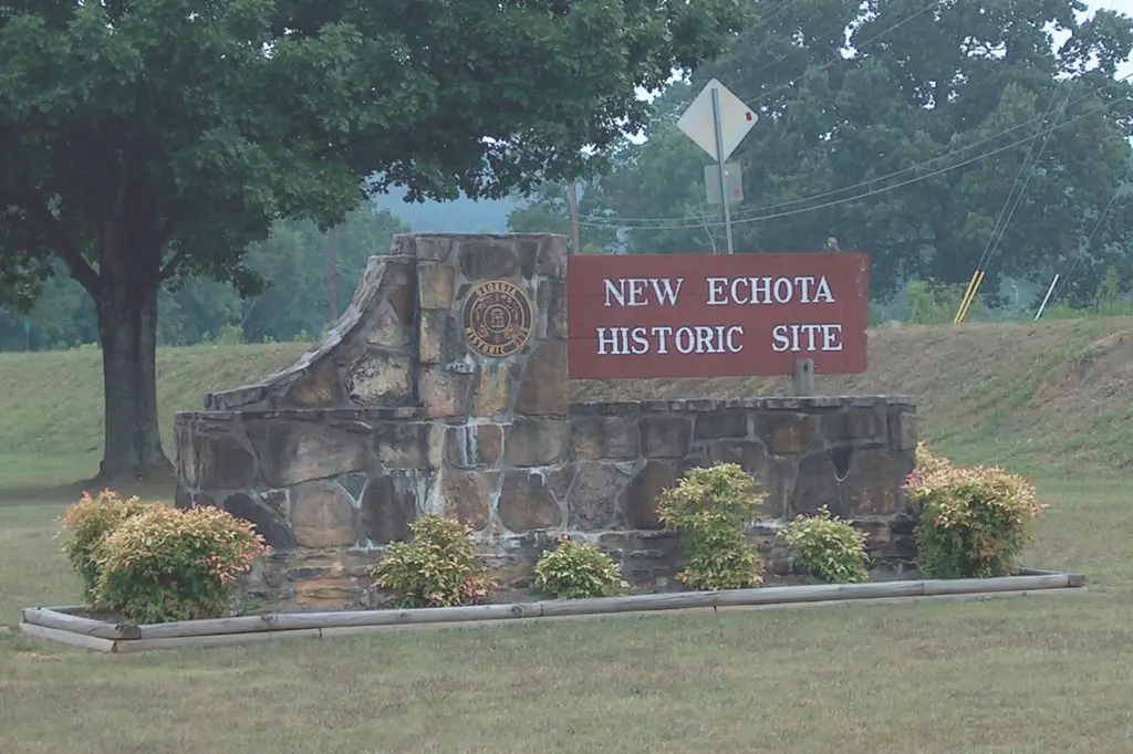 New Echota Sign between parking lot and Highway 255 as Entrance to New Echota Historical Site