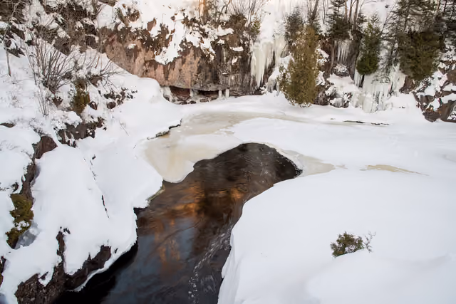 Temperance Falls bridge along Lake Superior shoreline roadway is one of the Minnesota Department of Natural Resources' scenic winter…