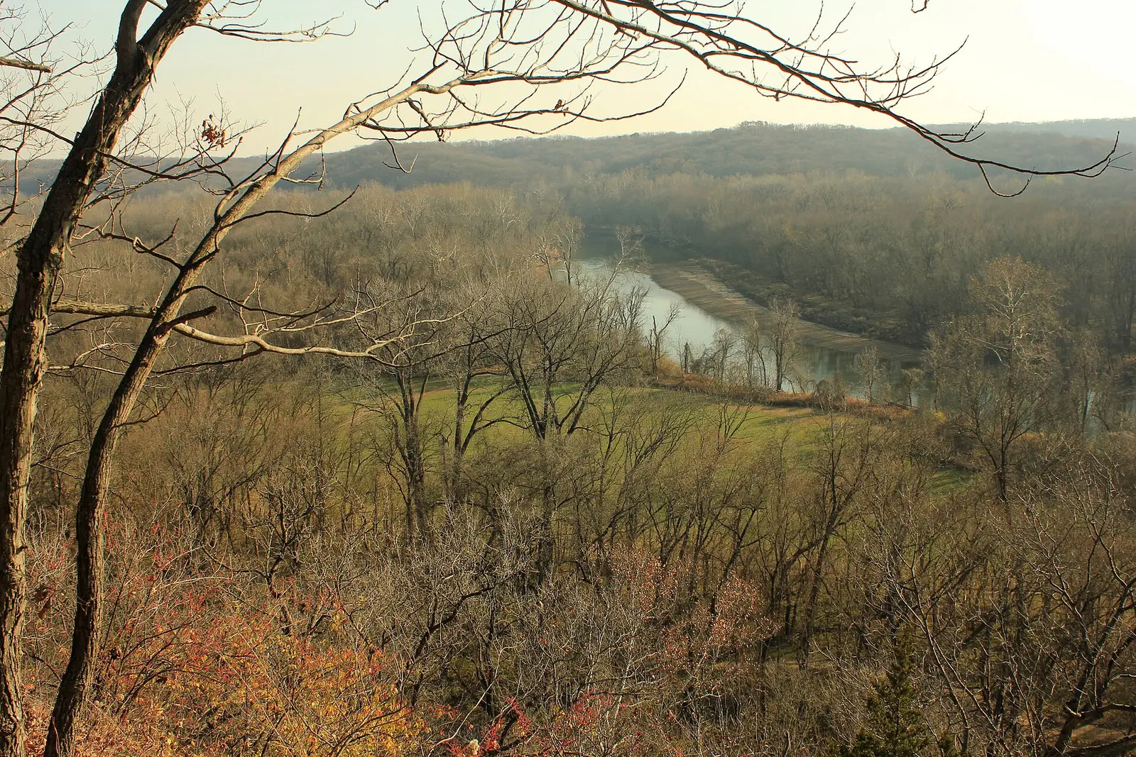 Scenic view of the river, meadow, and forest from Castlewood state park