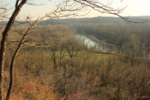 Scenic view of the river, meadow, and forest from Castlewood state park