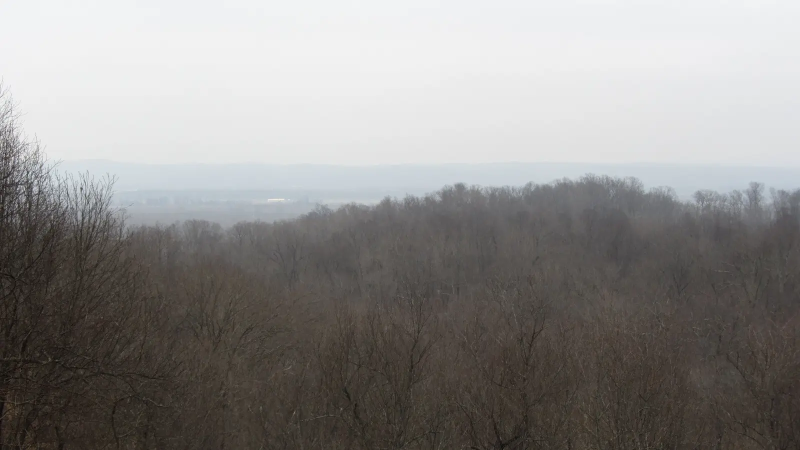A distant, hazy view of the Mississippi River from the Trail of Tears State Park in Cape Girardeau County, Missouri Keywords: trte;…