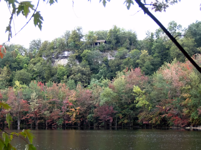 The Glacier (Green) lake in w:Clark Reservation State Park , New York, and the cliff of the former waterfall