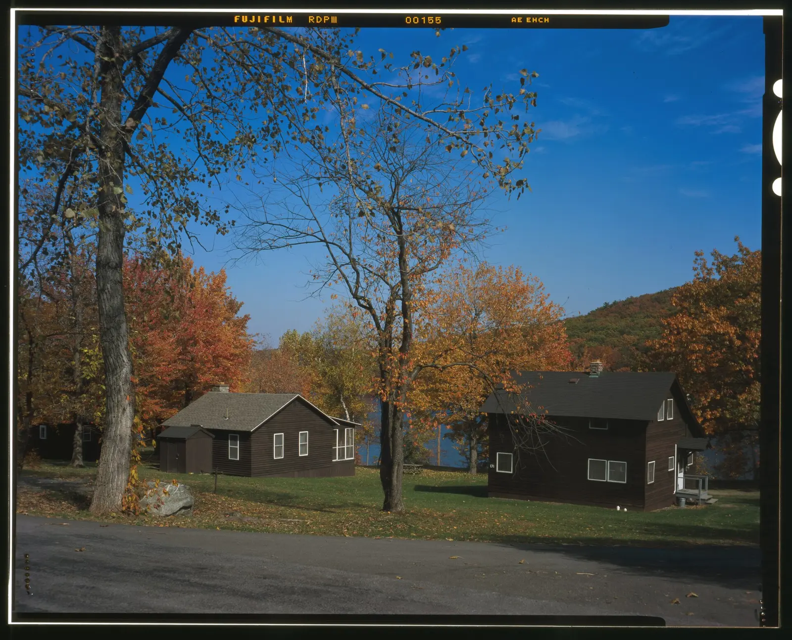LAKE TAGHKANIC STATE PARK, WOOD-SIDED CABINS WITH THE LAKE IN THE BACKGROUND, VIEW NW. - Taconic State Parkway, Poughkeepsie, Dutchess…