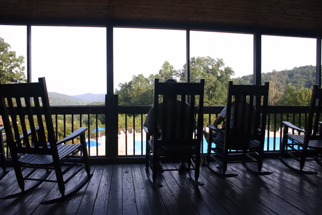 Rocking chairs line the second floor back porch of the lodge at Shawnee State Park in Scioto County, Ohio