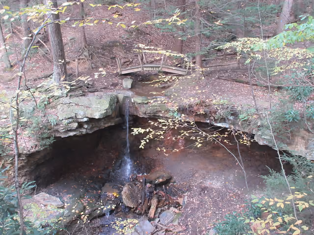 Except during periods of heavy rain, only a small volume of water crests Adams Falls in Linn Run State Park