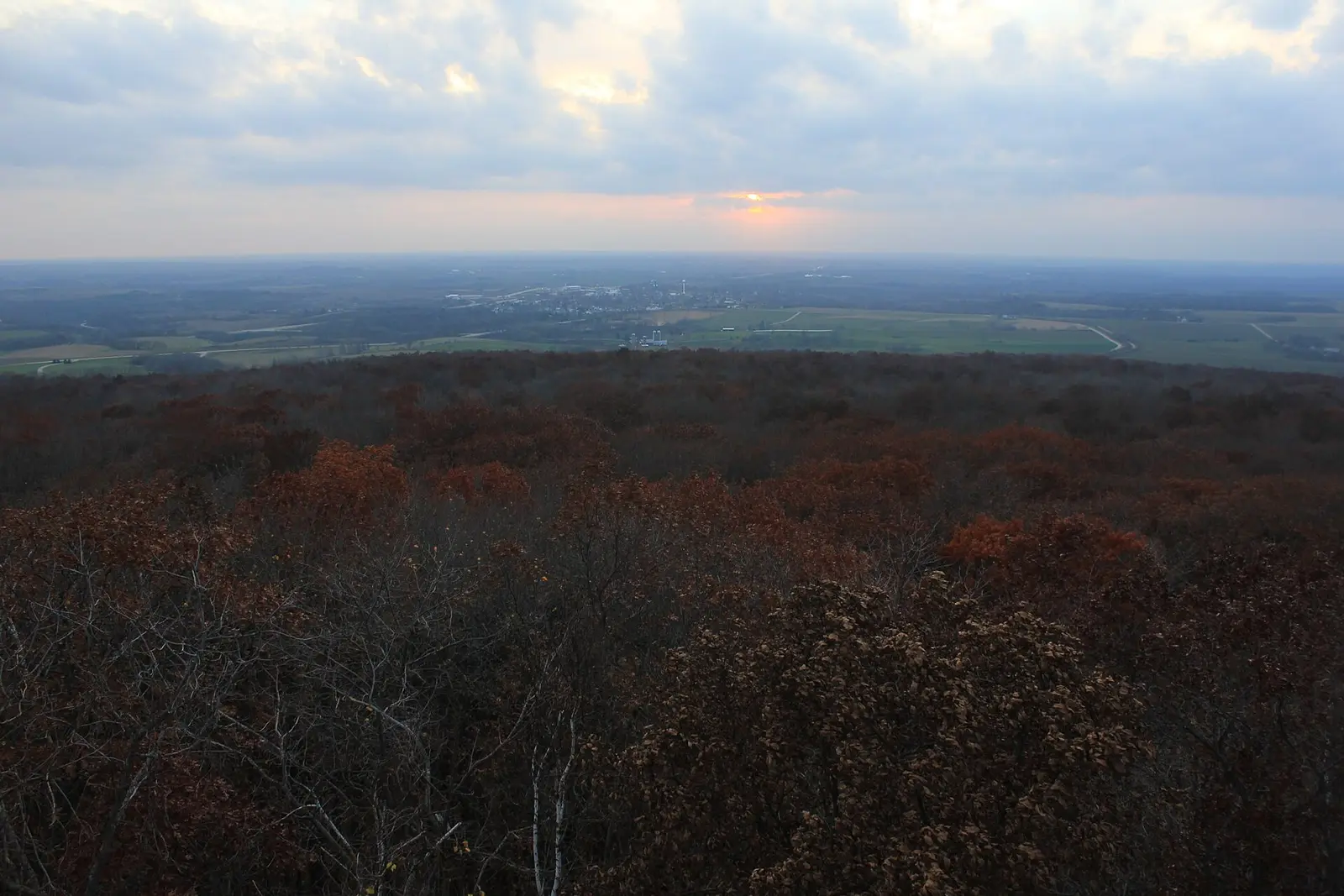 Great view at sunset from west tower looking at forest and fields at Blue Mound State Park