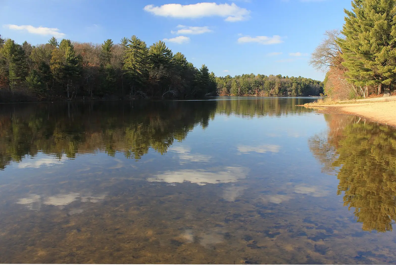 Landscape and clouds reflected in water at Mirror Lake State Park