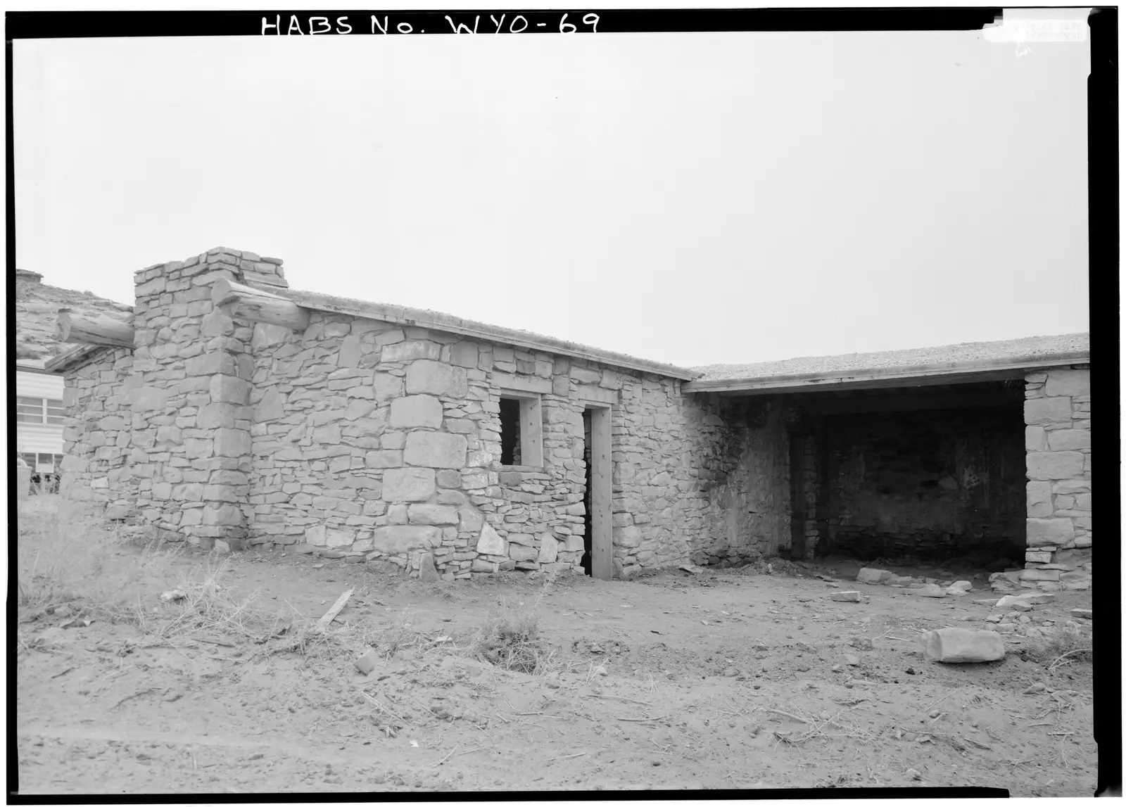 Detail of east facade showing covered porch - Point of Rocks Stage Station, Rock Springs vicinity, Point of Rocks, Sweetwater County, WY…