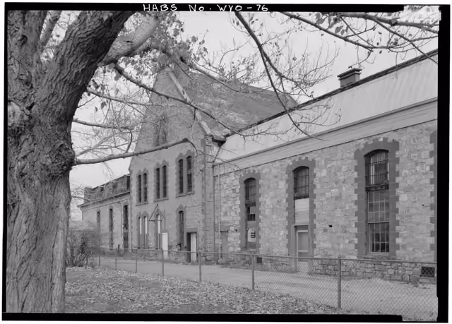 Near view of west facade from southwest - Wyoming Territorial Penitentiary, North side of State Route , West Laramie, Albany County, WY…